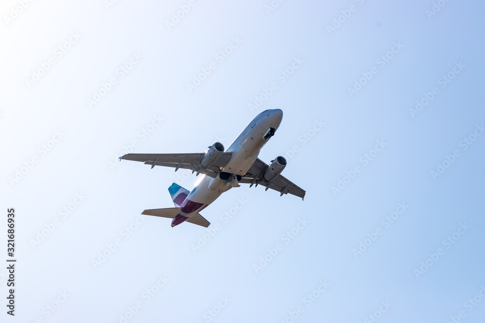 Airplane take off from airport. Travel by air, climate crisis, transportation Airplane take off from airport. Travel by air, climate crisis, transportation