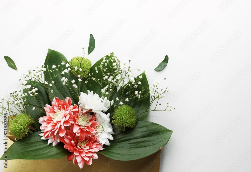 Close up beautiful spring flowers bouquet for greetings isolated on white, copyspace