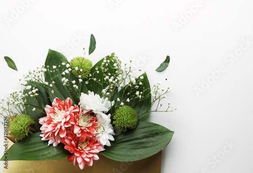Close up beautiful spring flowers bouquet for greetings isolated on white, copyspace