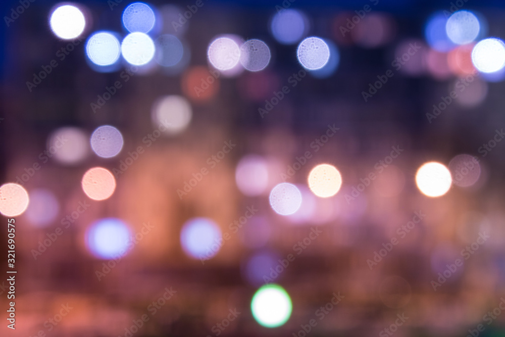 Abstract blurred background with copy space. Defocused night city with bokeh effect lanterns Abstract blurred background with copy space. Defocused night city with bokeh effect lanterns
