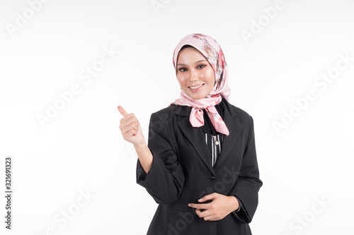 Fényképezés Half length portrait of a beautiful Muslim woman wearing business attire and hijab with mixed poses and gestures isolated on white background