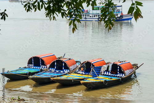 Traditional wooden fishing boats in river Hooghly or Ganga. Kolkata. India
