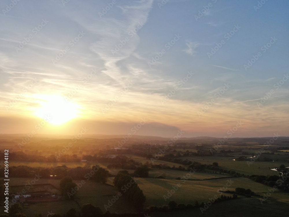 lovely countryside seen in warm evening light aerial drone shot