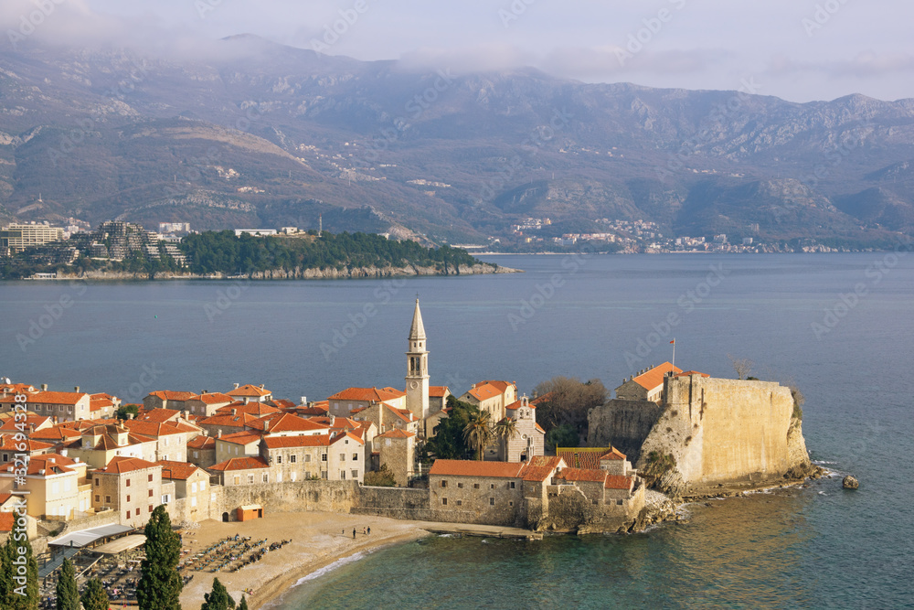 Fototapeta premium Beautiful winter Mediterranean landscape. Montenegro, Adriatic Sea. View of Old Town of Budva