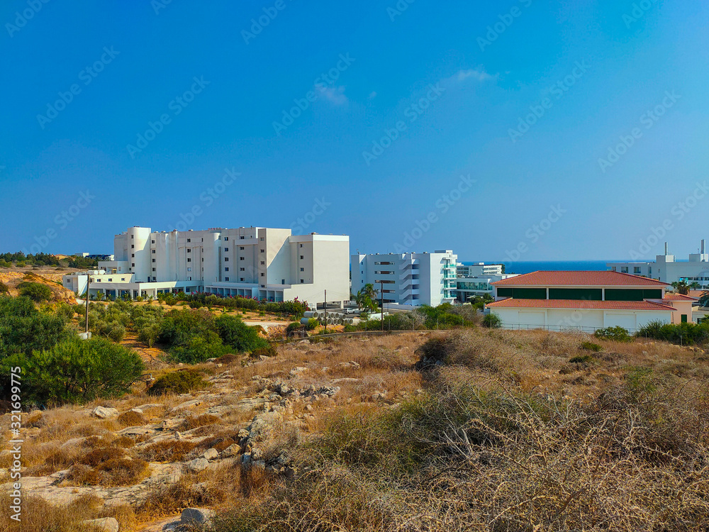 Ayia Napa, Cyprus - September 07, 2019: View to hotels of Ayia Napa from hill.