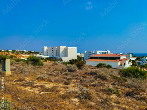 Ayia Napa, Cyprus - September 07, 2019: View to hotels of Ayia Napa from hill.