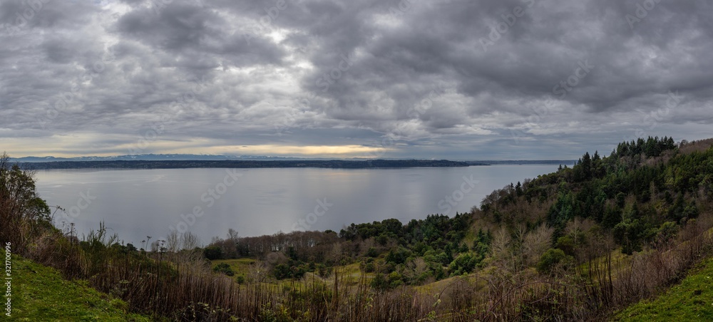 Overcast day with beautiful clouds as seen from overlook on Vashon Island looking towards Puget Sound and North Tacoma 