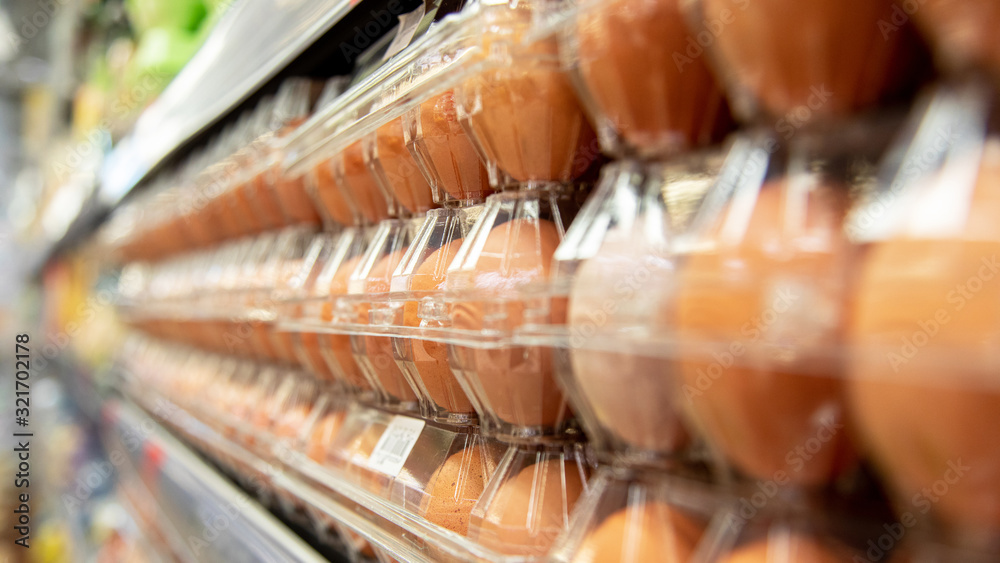 Variety brand of Eggs pack on shelves in a supermarket. Egg and dairy are the main sources of protein and calcium.