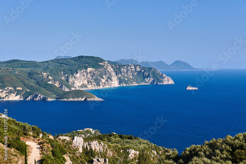 Fototapeta Naklejka Na Ścianę i Meble -  View to rocky peninsula and bay at Corfu island, Greece.