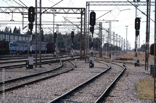 Crossing of a set of railroad and traffic lights tracks near the station in Podgorica, Montenegro