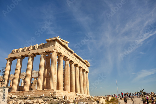 ATHENS, GREECE - 2019 May 18: Tourists in ancient ruins Parthenon Temple in a summer day in Acropolis Greece, Athens