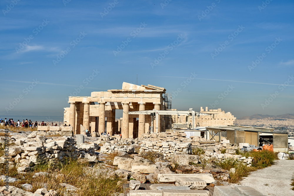 ATHENS, GREECE - 2019 May 18: Tourists in ancient ruins Parthenon Temple in a summer day in Acropolis Greece, Athens