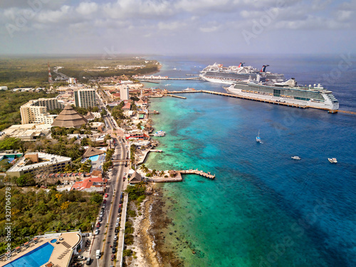 Aerial vie of Cozumel Island beach with turquoise water and cruise ships on the background photo