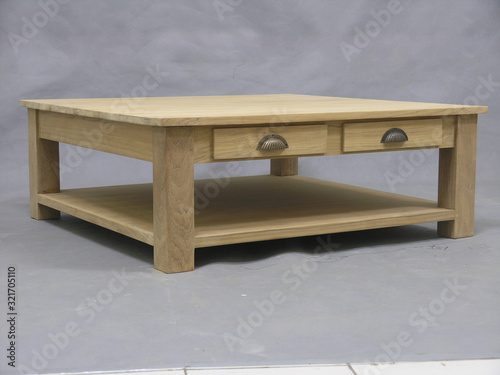Classy Modern Luxury Wooden Table for Home Interiors Furniture in Isolated Background © Yudhistira