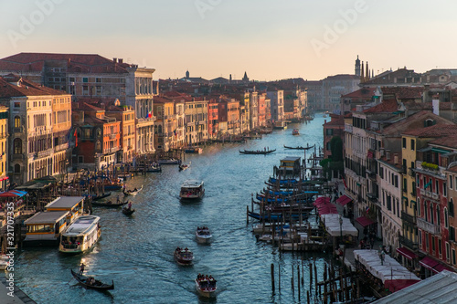 Walking on the bridges of the old city of Venice. The beauty of the ancient city. Italy.