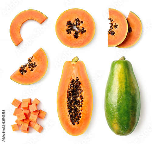 Set of fresh whole and half papaya fruit and slices