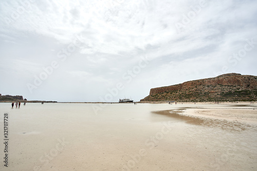 Greece, Crete, Balos Lagoon, May 22, 2019: tourists enjoy balos lagoon beachin Crete island in Greece. photo