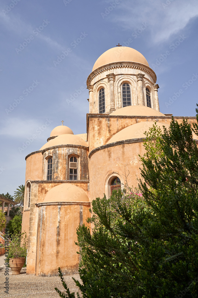 Agia Triad monastery in Crete in Greece. Patio with fruit trees Agia Triad monastery in Crete in Greece. Patio with fruit trees