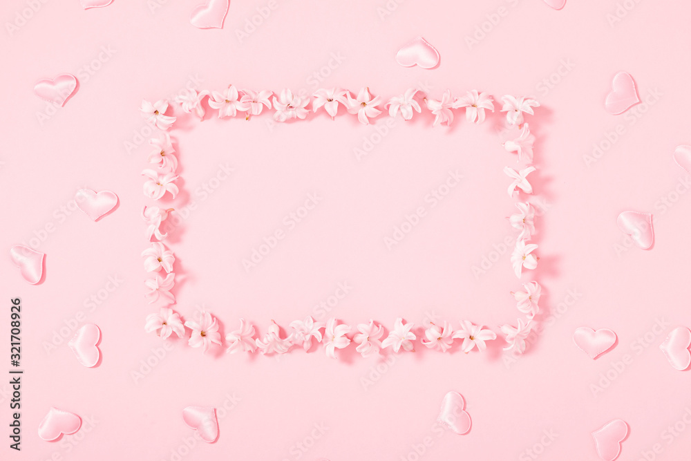 Beautiful flowers composition. Pink flowers on pastel pink background. Valentines Day, Easter, Birthday, Happy Women's Day, Mother's day. Flat lay, top view, copy space