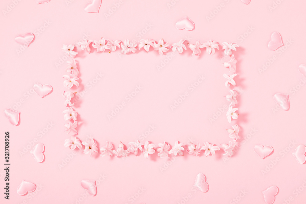 Beautiful flowers composition. Pink flowers on pastel pink background. Valentines Day, Easter, Birthday, Happy Women's Day, Mother's day. Flat lay, top view, copy space Beautiful flowers composition. Pink flowers on pastel pink background. Valentines Day, Easter, Birthday, Happy Women's Day, Mother's day. Flat lay, top view, copy space