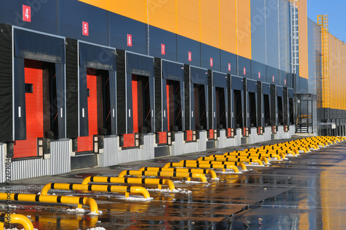 Front view of loading docks of a modern logistics center.