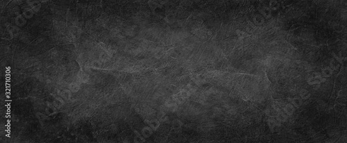 black texture background, old black crumpled paper in textured vintage design, elegant solid dark charcoal gray color with white creases photo