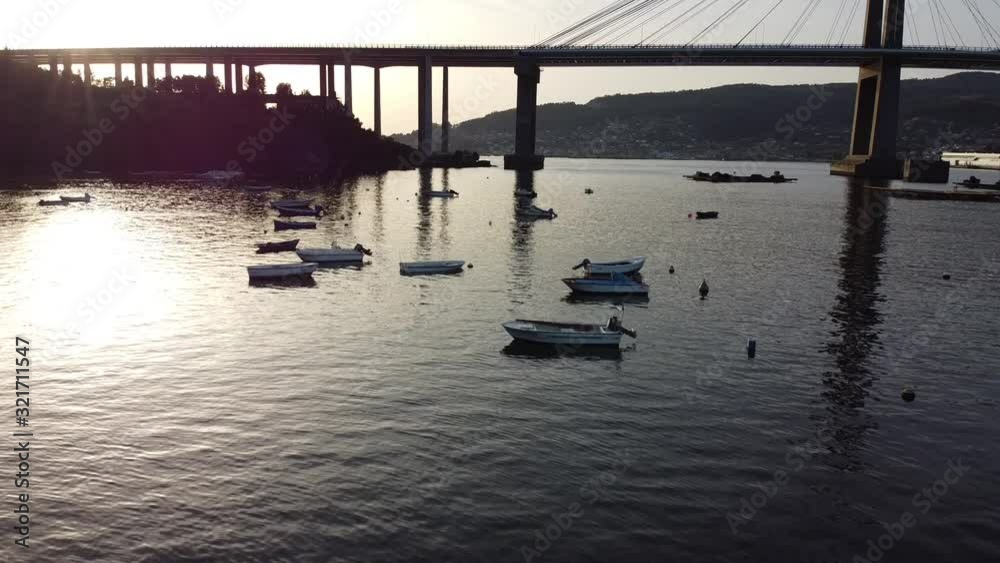 Drone flight over the sea with the Rande Bridge on the background in Vigo (Galicia, Spain) Drone flight over the sea with the Rande Bridge on the background in Vigo (Galicia, Spain)