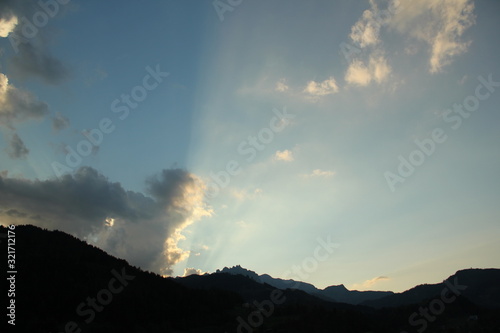 sunlight over mountain clouds