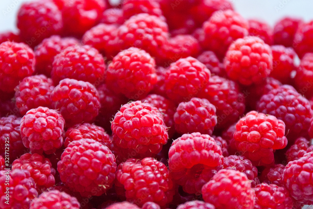 Fresh and sweet red raspberries background Fresh and sweet red raspberries background