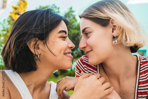 Loving lesbian couple having a date. photo