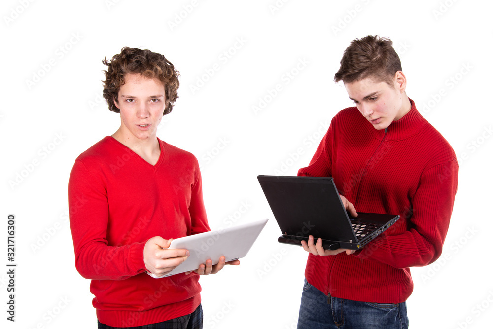 Two attractive students. Laptop. White background. Two attractive students. Laptop. White background.