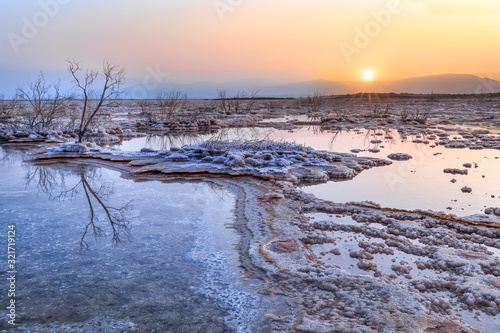  Dead Sea, Ein Bokek, Israel - February 18: Sunrise at the Dead Sea of Ein Bokek Dead Sea, Israel 