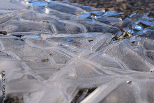 Frozen ice crystal on water