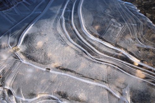 Frozen ice crystal on water