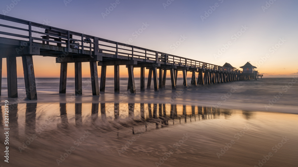 Old Naples pier, Florida, USA. Coastel dream with old and beauftiful architecture in Gulf of Mexico. Old Naples pier, Florida, USA. Coastel dream with old and beauftiful architecture in Gulf of Mexico.