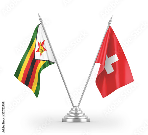 Switzerland and Zimbabwe table flags isolated on white 3D rendering photo