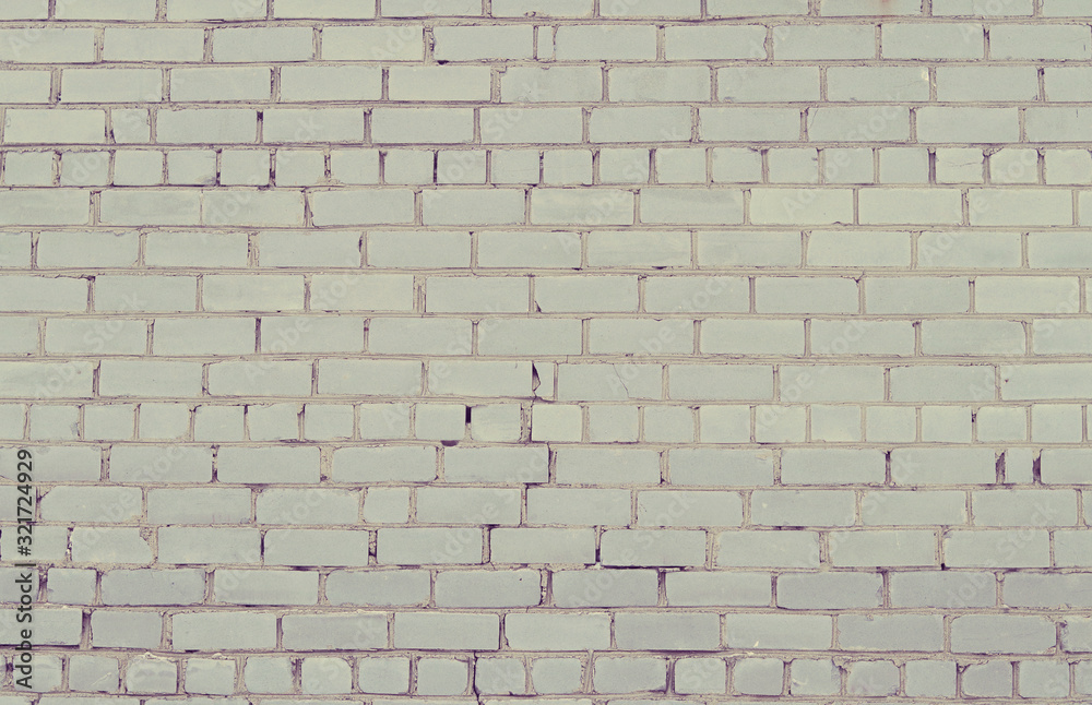 Brick wall in the grunge style. a beautiful background. Selective focus. Special warm treatment Brick wall in the grunge style. a beautiful background. Selective focus. Special warm treatment