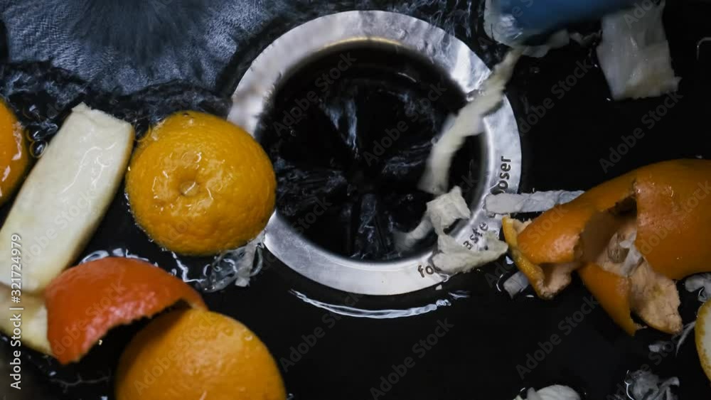 Kitchen disposer to grind food waste. Food shredder in the sink