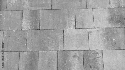 Wallpaper Mural the background of the tatuary tiles of gray color on the dore street illuminated by scattered daylight Torontodigital.ca