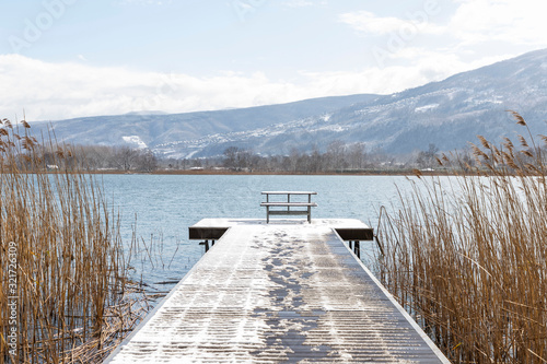 Fototapeta Naklejka Na Ścianę i Meble -  wooden walkway on sapanca lake in winter