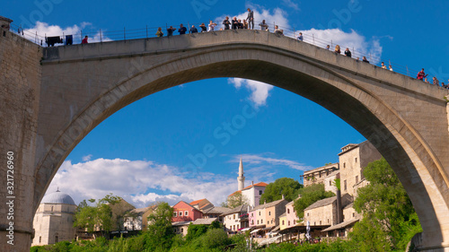 Mostar / Bosnia & Herzegovina - April 2019: People Mostar Bridge (Stari Most). Old Mostar Bridge full of tourists.