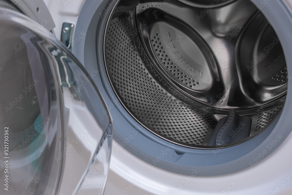 Washing machine drum close up, front view Washing machine drum close up, front view