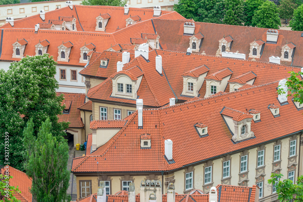 Top view to red roofs of Prague city Czech republic.