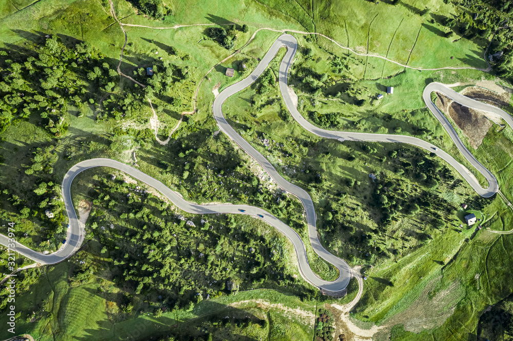 Top down view of winding road in Dolomites