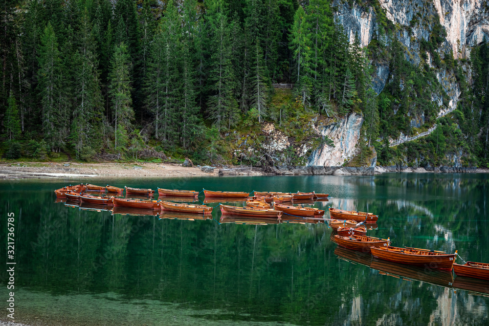 Lago di Braies and boats on lake in summer, Dolomites