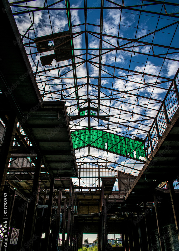 The sky from the inside of an abandoned factory