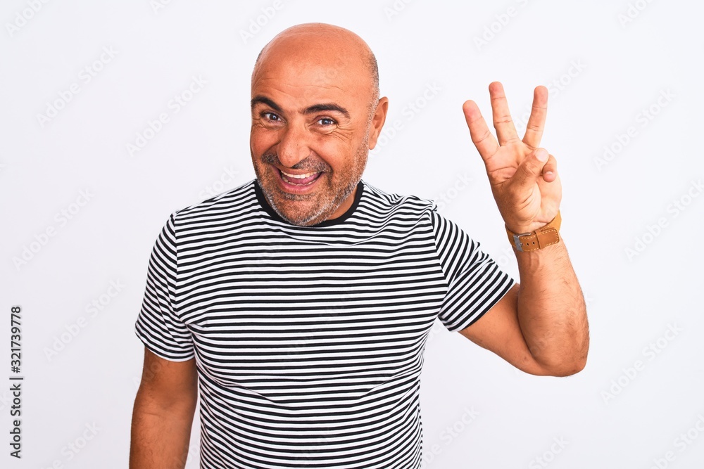 Middle age handsome man wearing striped navy t-shirt over isolated white background showing and pointing up with fingers number three while smiling confident and happy. Middle age handsome man wearing striped navy t-shirt over isolated white background showing and pointing up with fingers number three while smiling confident and happy.