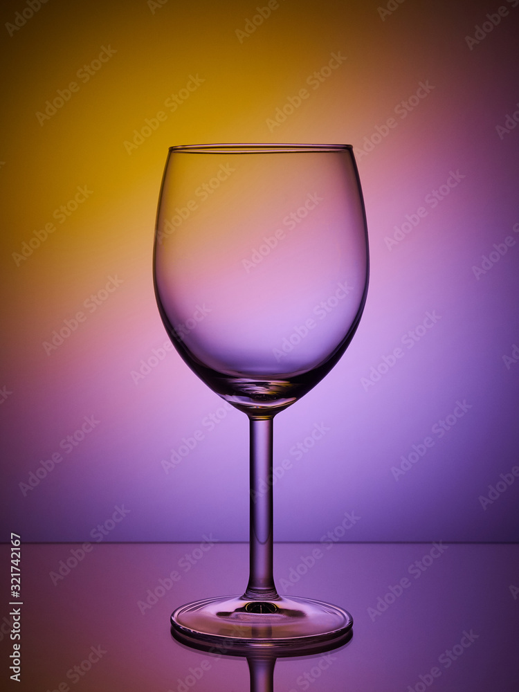 Glass close-up neon colored light gradient background Glass close-up neon colored light gradient background
