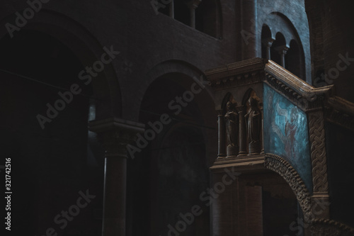 Wooden mezzanine of a church with saints painting