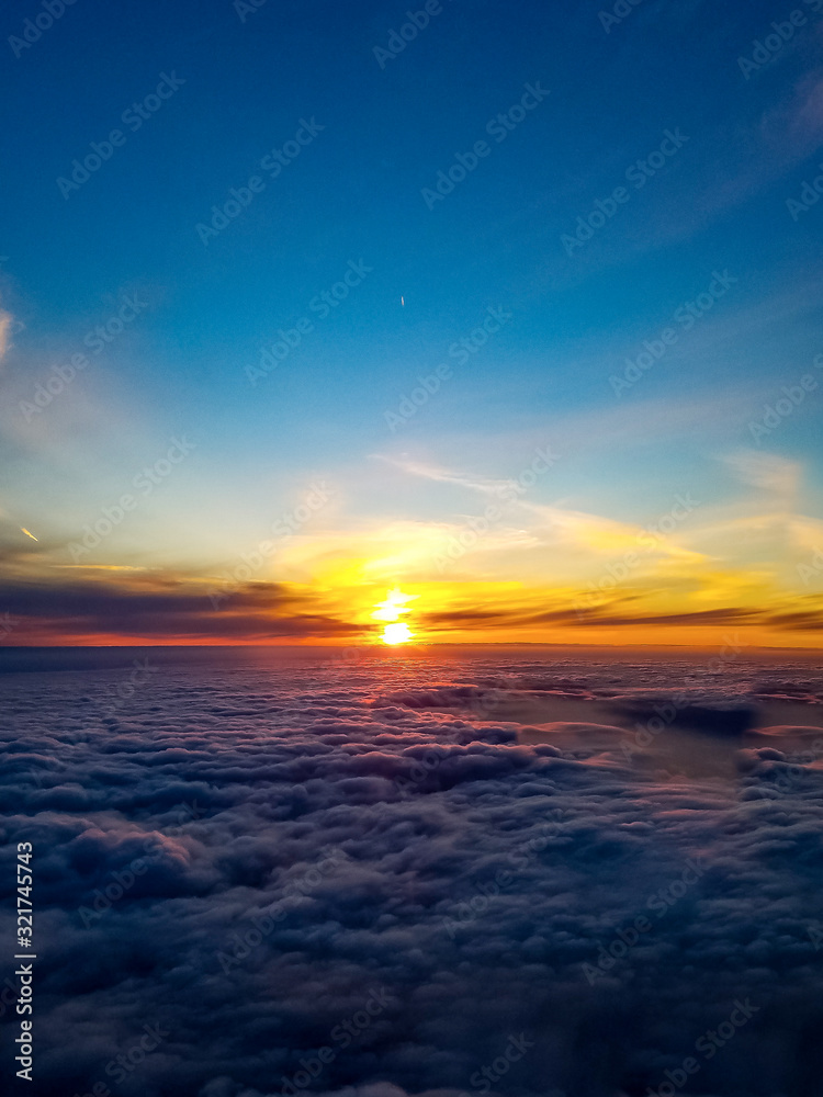 sunset over the clouds